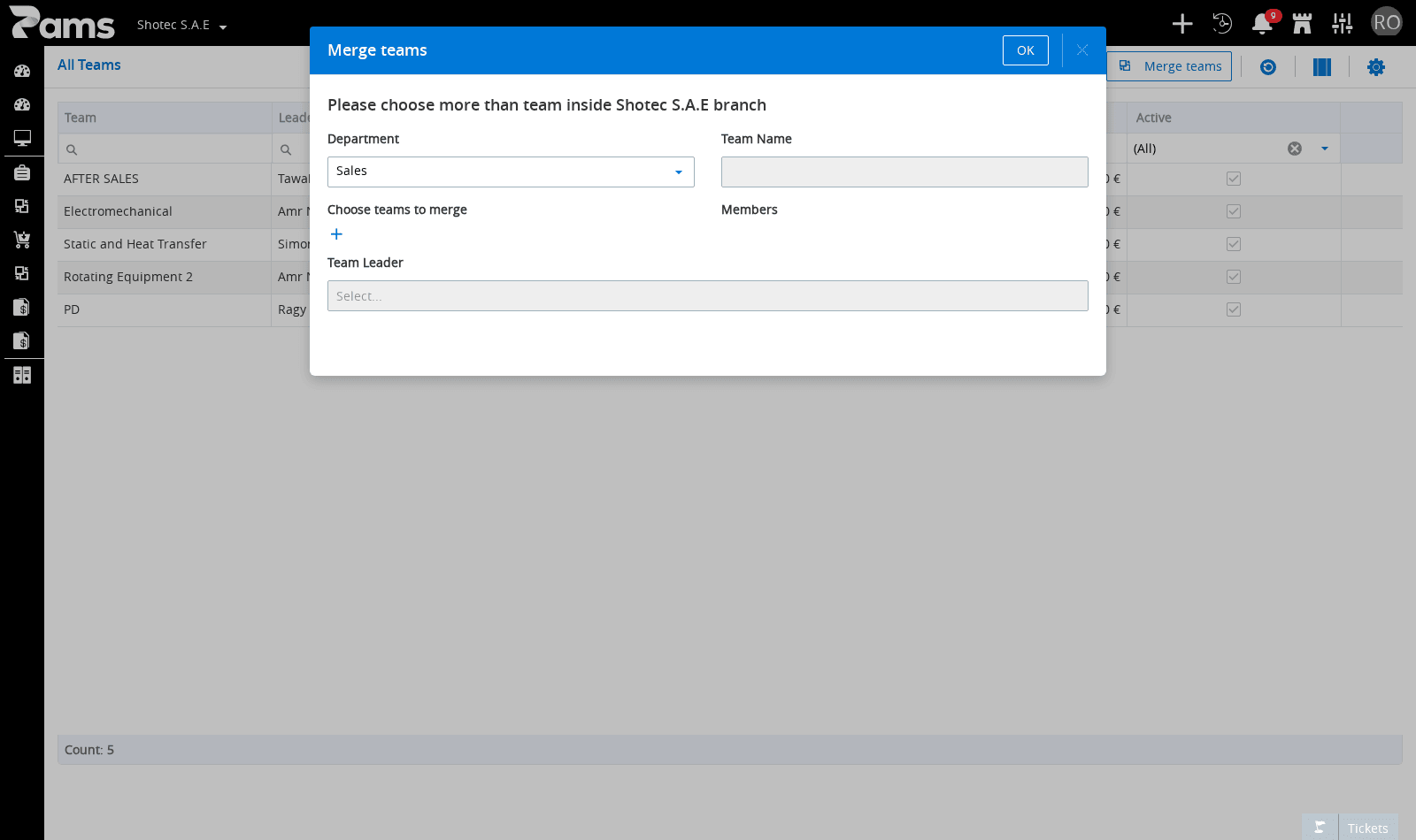 The merge dialog with its team-selection fields and OK button.